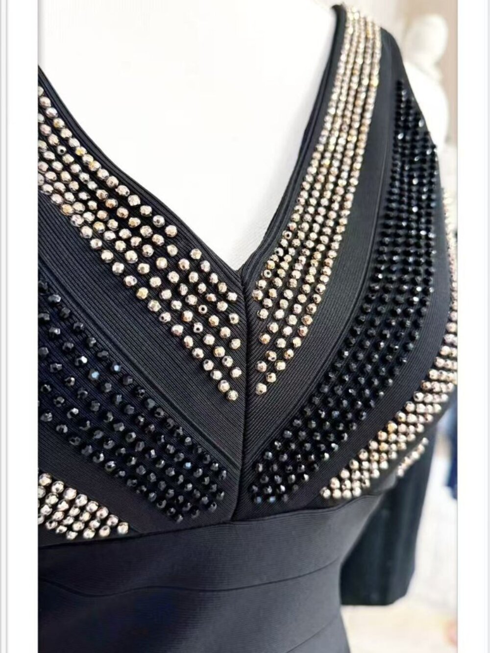 Heavily beaded chevron-patterned V-neck dress size 10